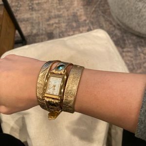 La mer gold wrap watch